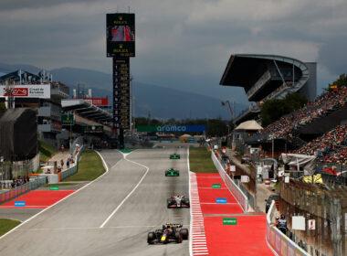 a race track with cars driving on it