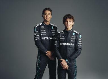 a couple of men standing next to each other